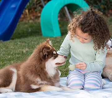 girl_and_puppy_having_teaparty